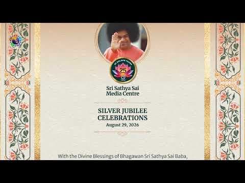 Team SSSMC Offers the Silver Jubilee Invitation Card at the Divine Lotus Feet